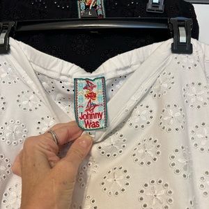 Johnny Was “Pauline” eyelet leggings. Two pair; black & white both size Large